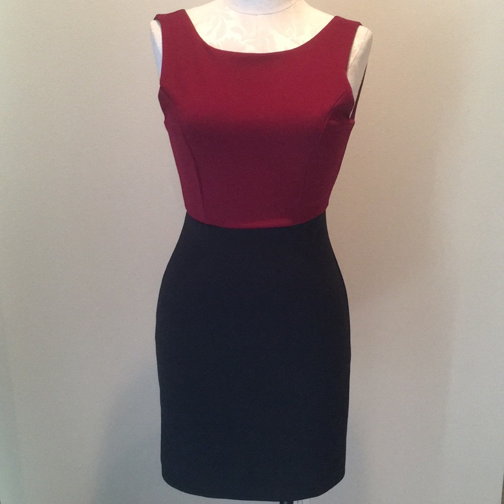 Color block dress with open back and bow detail